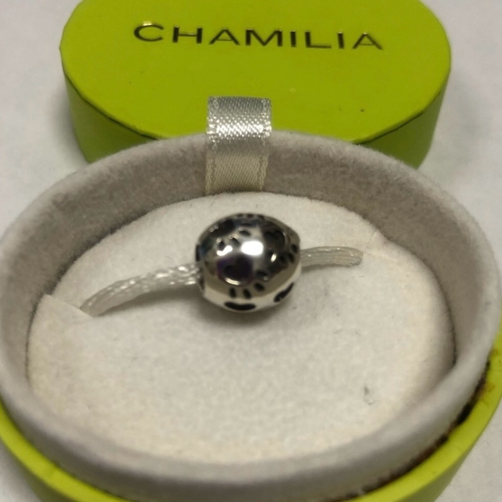 NEW- Chamilia “Dog print” bead is sterling silver NWOT